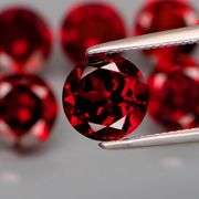 LOOK! It’s a whole set of Mozambique Garnet solitaires! 8.95 carats of them!
