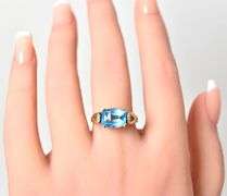 Elegant 10K Yellow Gold Blue Topaz Gemstone Ring with Diamond Accents