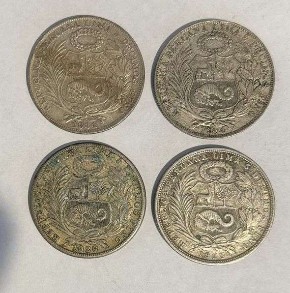 Collection of four Peruvian Un Sol Silver Coins