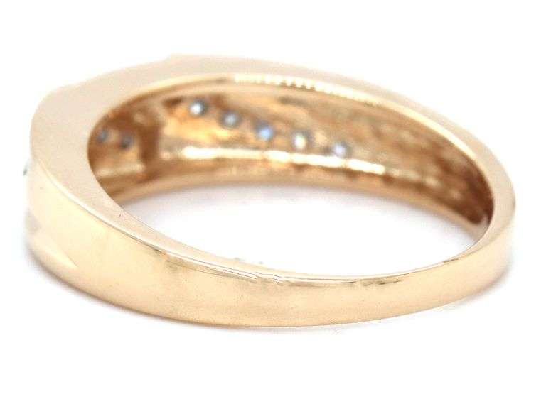 14kt Yellow gold 0.30ctw channel set diamond bypass ring