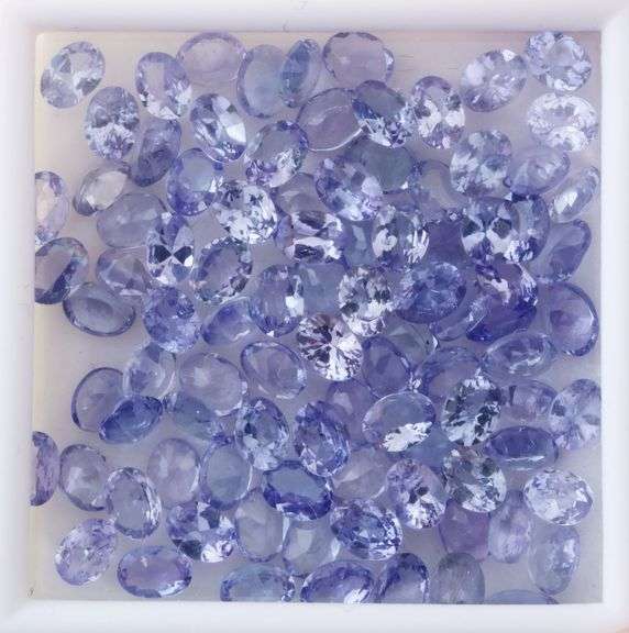 Heavy flashing! Untreated! 14.84ct oval cut Tanzanite set!