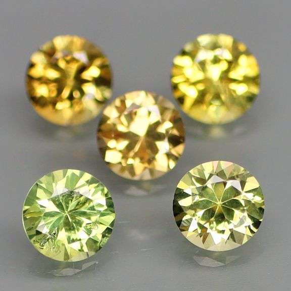 Amazing! 2 full carats of collectors REAL diamond cut Chrysoberyl!