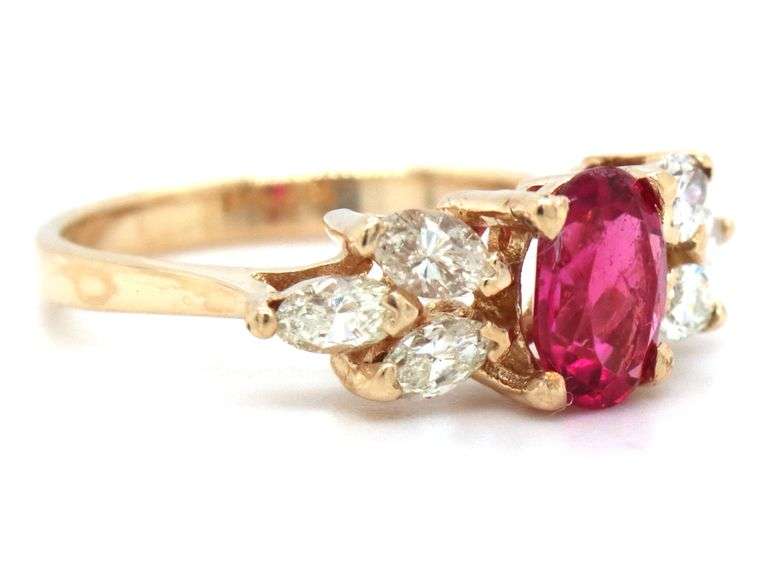 14kt Yellow gold oval tourmaline and marquise diamond ring