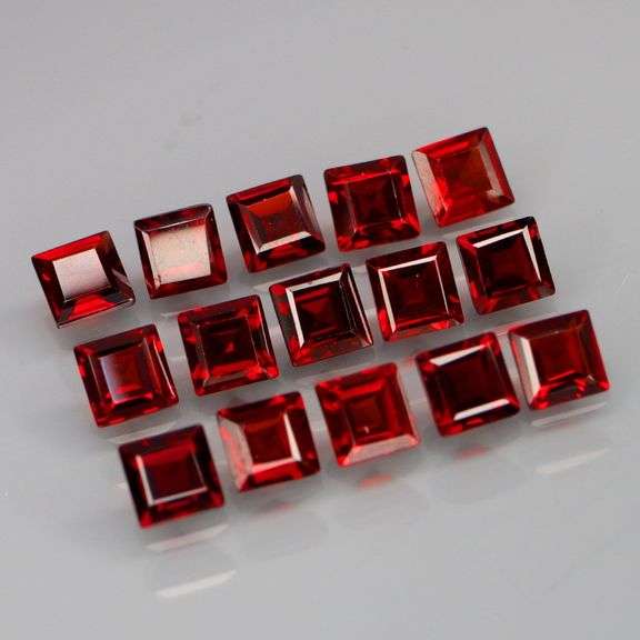 Tremendous 7.25ct princess cut cherry red Garnet set