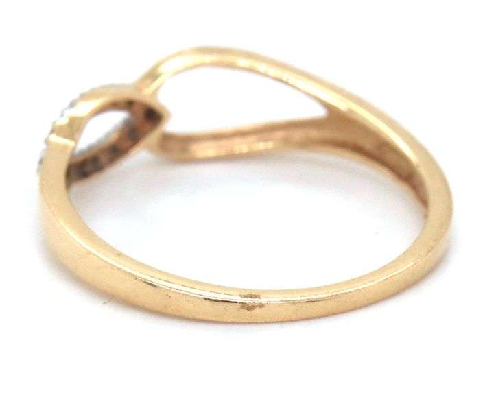 14kt Yellow gold infinity style diamond ring