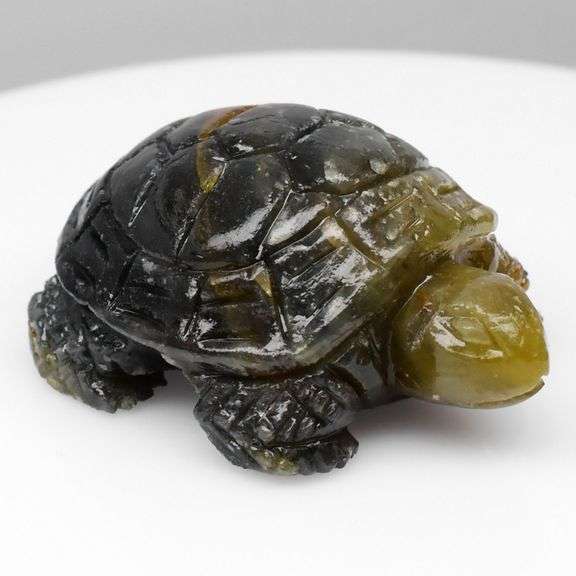Wow! Look at this 107.55ct Turtle cut from pure Tanzanian Sapphire!
