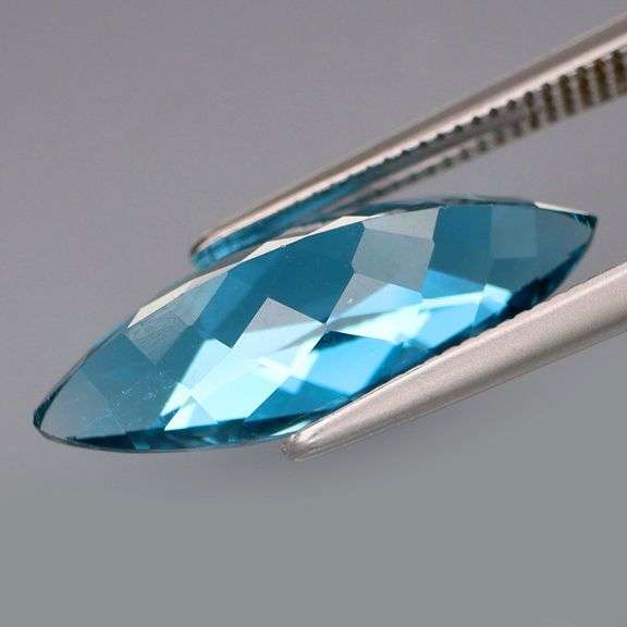 It's 5.10 carats! It's London Blue! It's marquise cut! It's 18.4mm long!