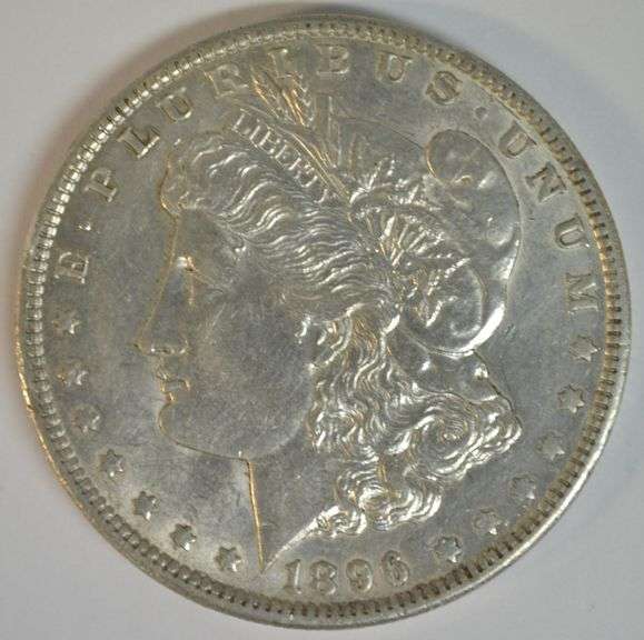 Satiny-white nearly BU 1896-O Morgan Silver Dollar. Scarce this nice