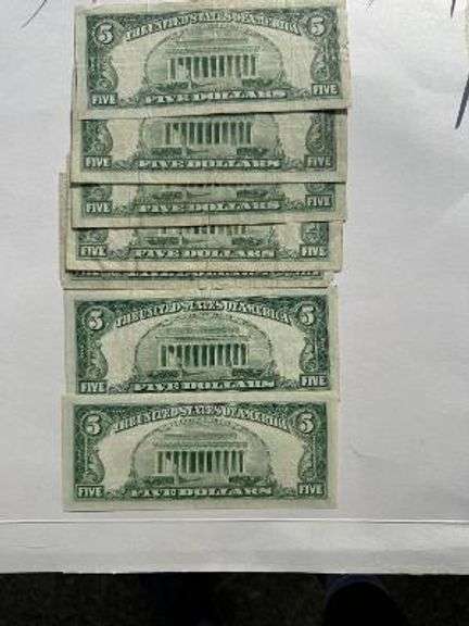 Seven 1953 Red Seal $2 US Notes.