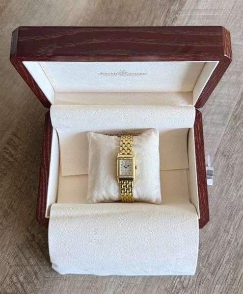 Simply stunning 18k yellow gold Jaeger-LeCoultre Reverso wristwatch with diamond accents