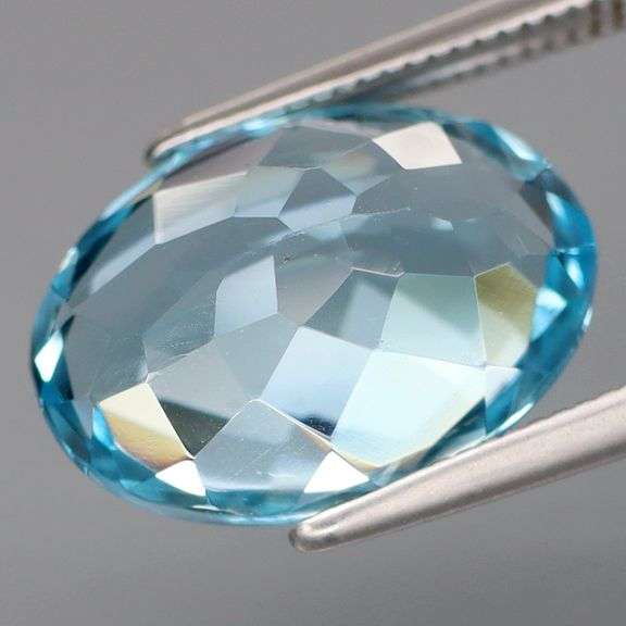 Absolutely stunning 8.18ct 14x10mm vibrant Swiss blue Topaz
