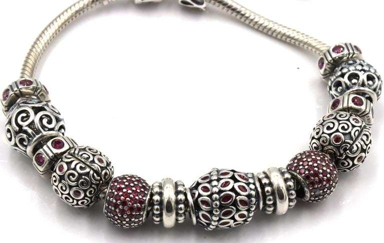 Pandora bracelet with red charms