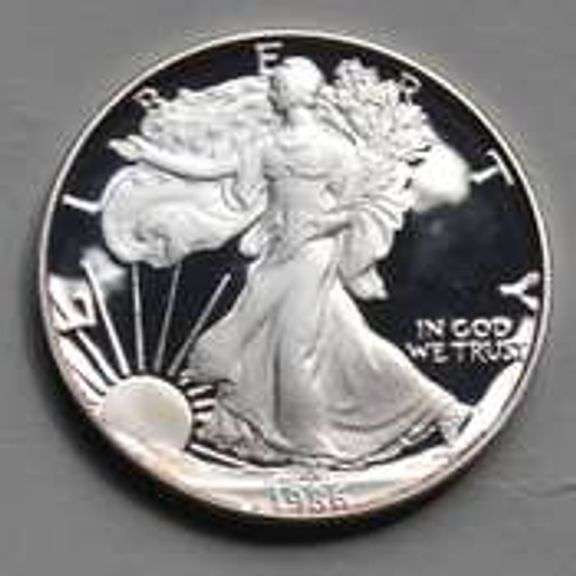 Two 1986 S Proof Silver Eagles with Box and Paper.