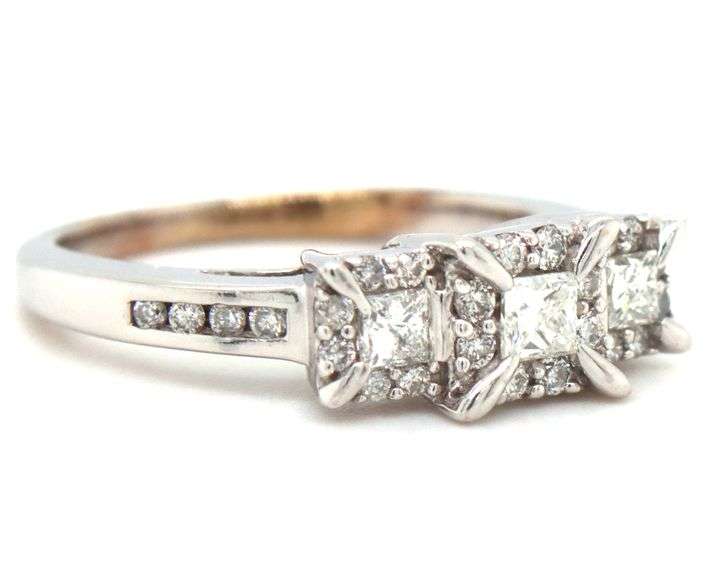 14kt White gold 0.65ctw princess and round brilliant cut 3 stone diamond halo ring