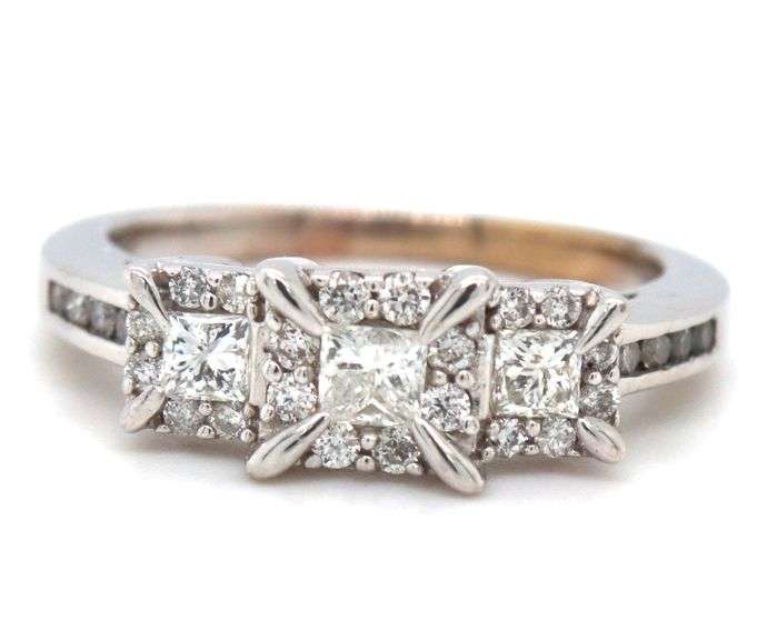 14kt White gold 0.65ctw princess and round brilliant cut 3 stone diamond halo ring