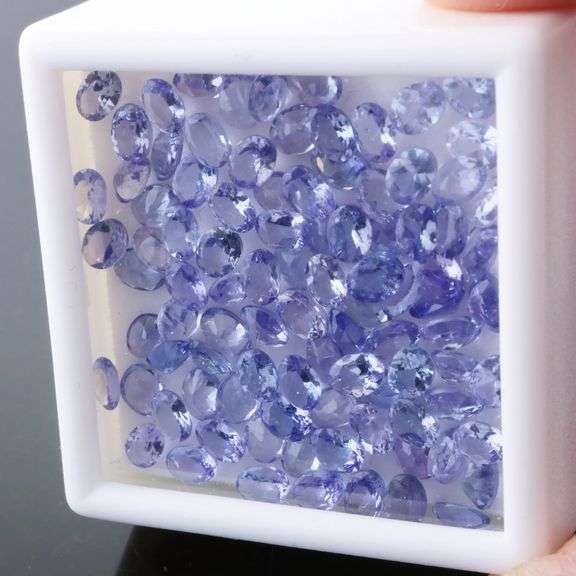 Heavy flashing! Untreated! 14.84ct oval cut Tanzanite set!