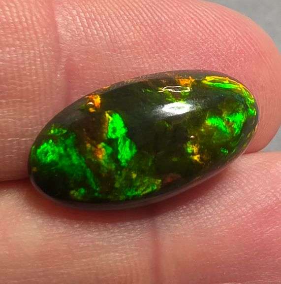 It's over 20mm long! And full of color! 5.80ct Black Opal from Ethiopia!