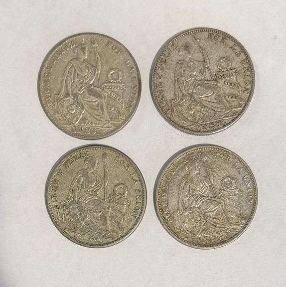 Collection of four Peruvian Un Sol Silver Coins