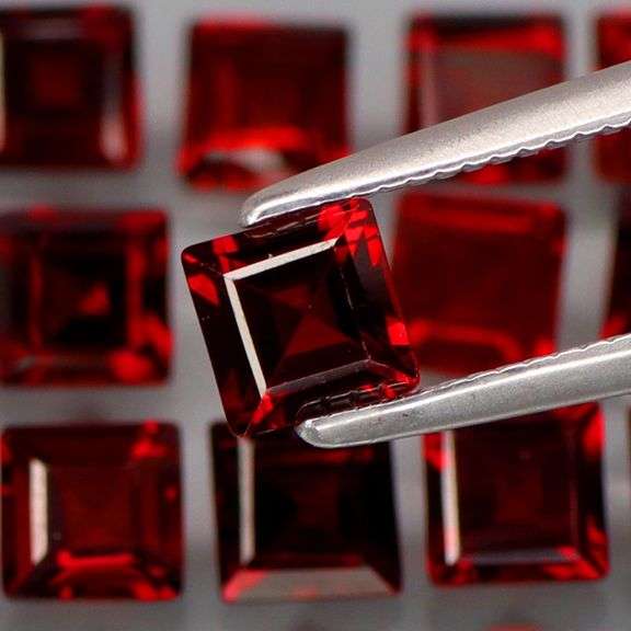 Tremendous 7.25ct princess cut cherry red Garnet set