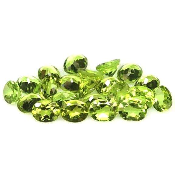 Dazzling 8.71ct untreated apple green Peridot set