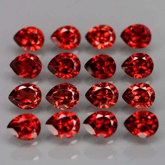 Outstanding 6.62ct pear cut high fire Mozambique Garnet set