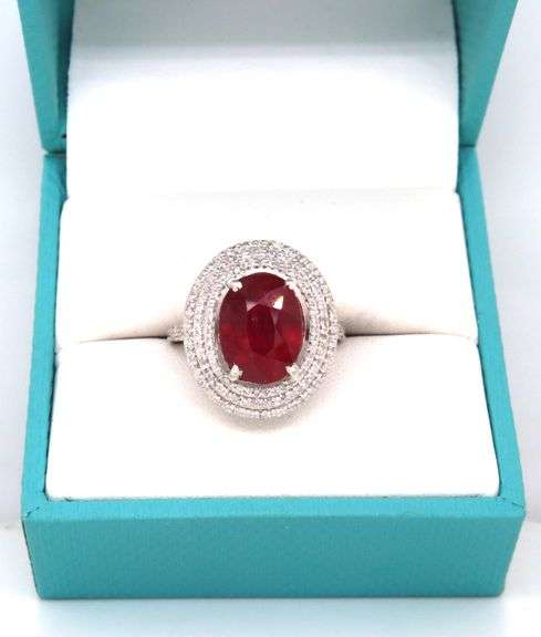 Darling 7.80CTS Oval Faceted Ruby & 1.50CTW Diamond Halo Ring in Sterling Silver