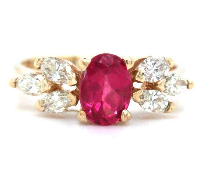 14kt Yellow gold oval tourmaline and marquise diamond ring