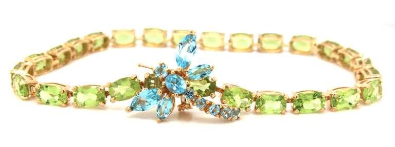 14kt Yellow gold oval peridot bracelet with blue topaz dragonfly