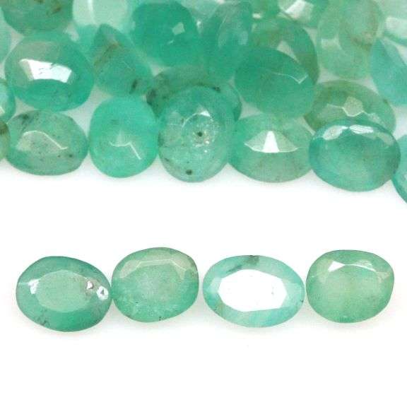 Vivid color in this 6.85ct Zambian Emerald set