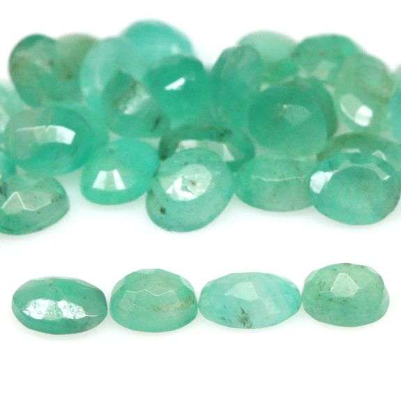 Vivid color in this 6.85ct Zambian Emerald set
