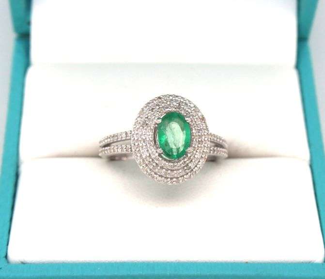 Mesmerizing 1.00CTS Oval Faceted Natural Emerald & Diamond Haloed Ring in Sterling Silver