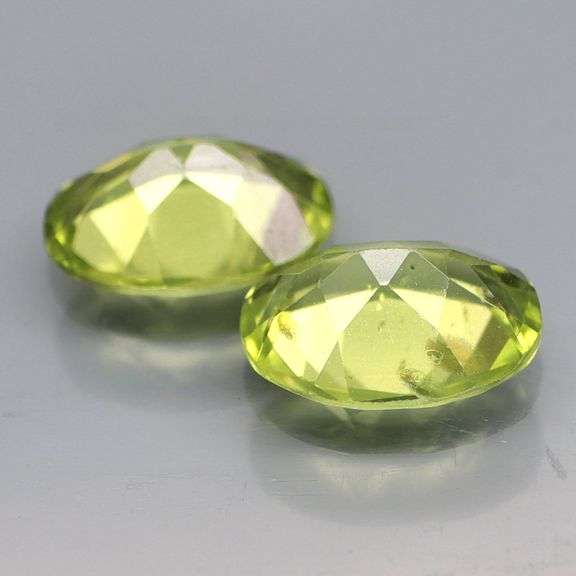 Gorgeous! 3.66ct glittering pair of 9x7mm matched Peridot!