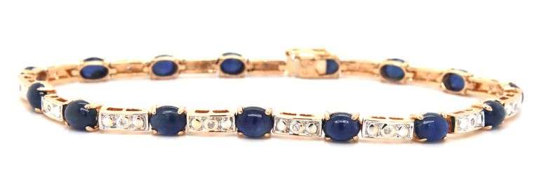 14kt Yellow gold 7.5ctw oval sapphire and diamond accent tennis bracelet
