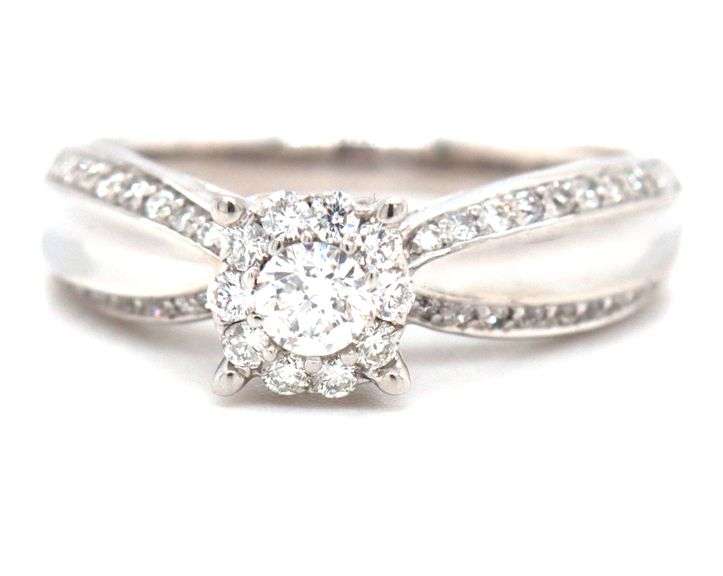 14kt White gold 0.55ctw diamond cluster engagement ring