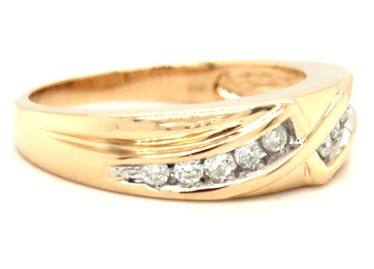 14kt Yellow gold 0.30ctw channel set diamond bypass ring