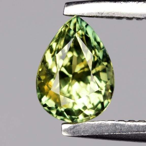 VS grade UNTREATED .52ct pear cut yellow green Sapphire