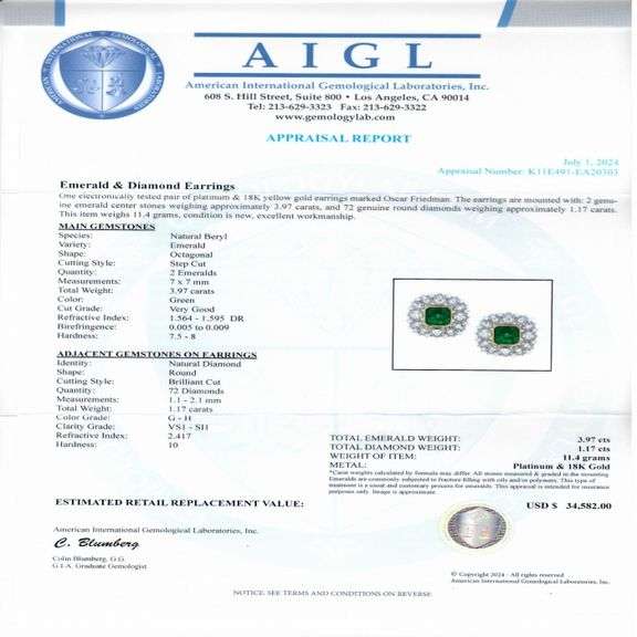 PLATINUM AND 18K YELLOW GOLD EMERALD AND DIAMOND AND EARRINGS 5.14 C.T.W.