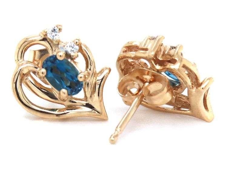Set of 14kt Yellow gold oval blue topaz and diamond accent pendant on chain with matching earrings