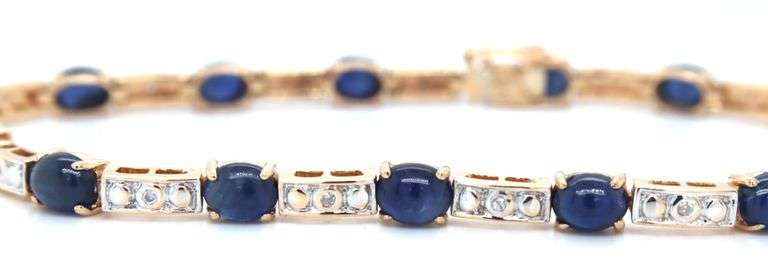 14kt Yellow gold 7.5ctw oval sapphire and diamond accent tennis bracelet