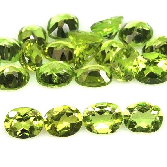 Dazzling 8.71ct untreated apple green Peridot set