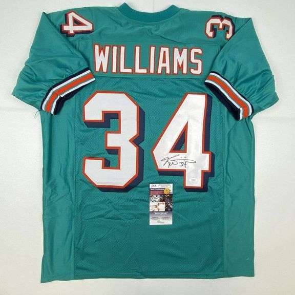 Ricky Williams Autographed Football Jersey with Authentication