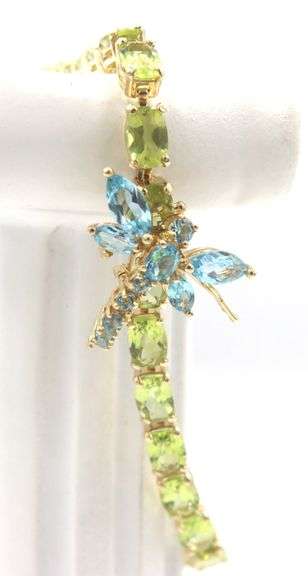 14kt Yellow gold oval peridot bracelet with blue topaz dragonfly