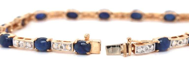 14kt Yellow gold 7.5ctw oval sapphire and diamond accent tennis bracelet