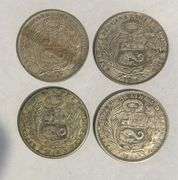 Collection of four Peruvian Un Sol Silver Coins