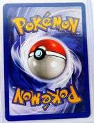 Pokémon 1999 Dark Slowbro 1st Edition Trade Card.