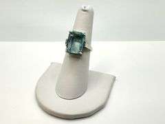 14 Kt White Gold Plate 6.5 Ct Simulated Sky Blue Topaz Ring.