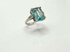 14 Kt White Gold Plate 6.5 Ct Simulated Sky Blue Topaz Ring.