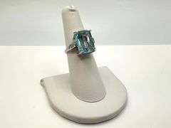 14 Kt White Gold Plate 6.5 Ct Simulated Sky Blue Topaz Ring.