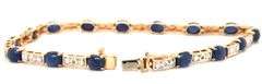 14kt Yellow gold 7.5ctw oval sapphire and diamond accent tennis bracelet