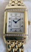 Simply stunning 18k yellow gold Jaeger-LeCoultre Reverso wristwatch with diamond accents